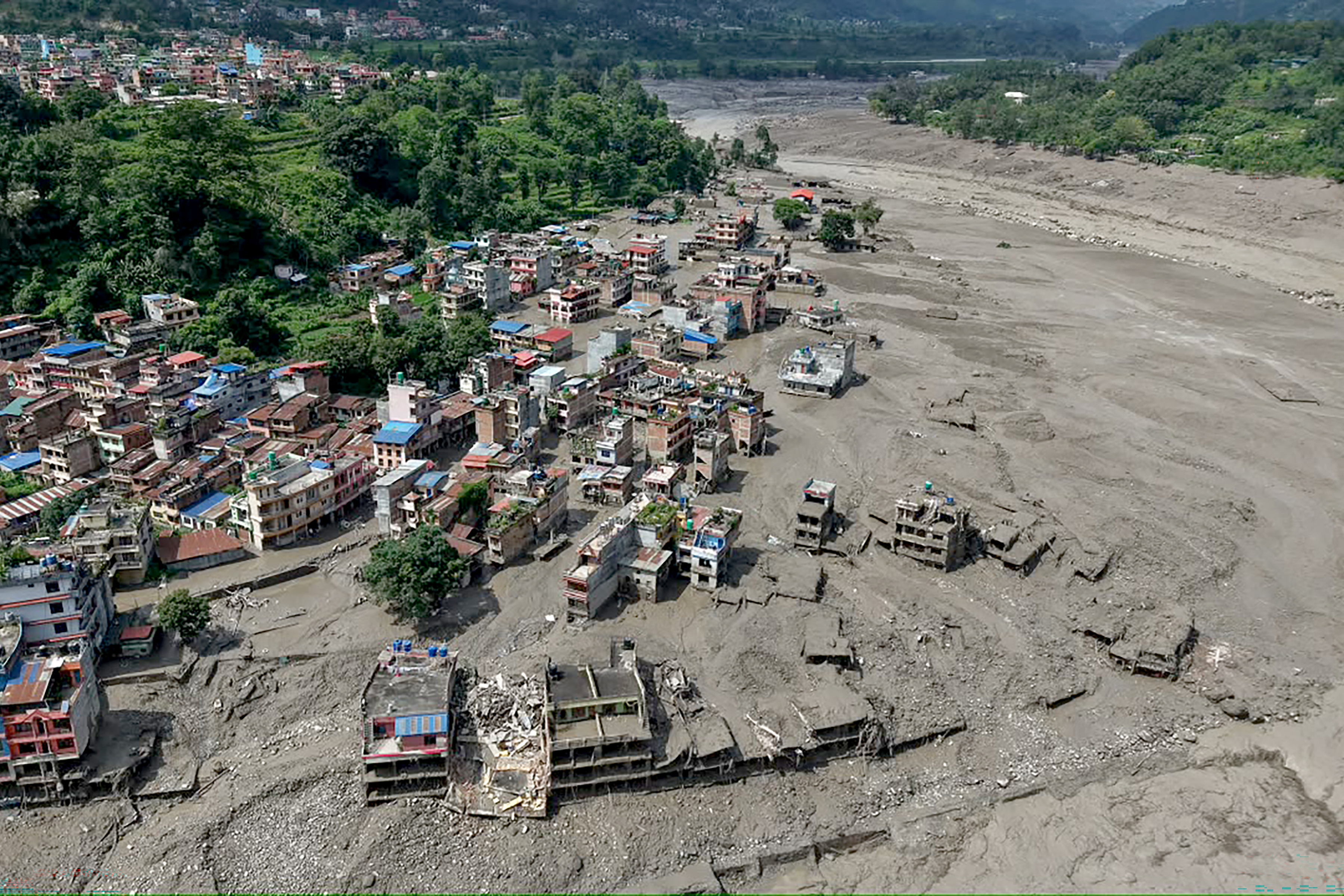 At least 75 dead and hundreds missing after catastrophic flash floods in Nepal
