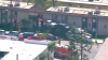 Big rig car hauler crashes into Panorama City apartment
