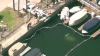 Driver escapes vehicle submerged in Huntington Beach harbor