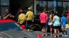 Woman hospitalized after car crashes into hair salon in Huntington Beach