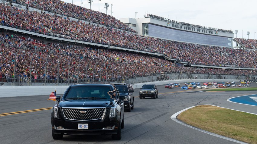 File photo. President Trump rides in his limousine, known as The Beast, at the Daytona International Speedway trailed by todays NASCAR race cars during the Daytona 500 race on Feb. 16, 2020 in Daytona, Florida.