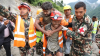 Two trapped workers are pulled alive from Nepal tunnel more than a week after deadly floods