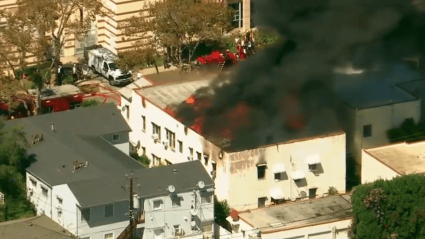 Firefighters responded to an apartment fire Wednesday morning in Beverly Hills.