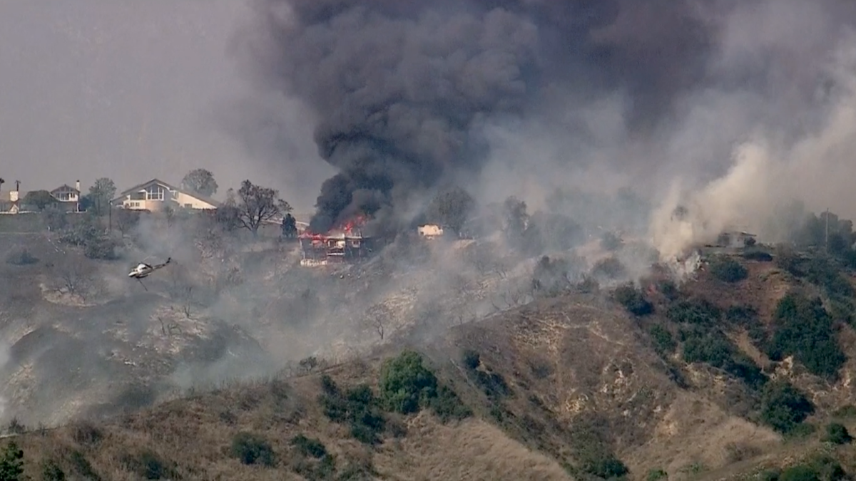 Brush fire spreads to hillside homes in La Habra Heights