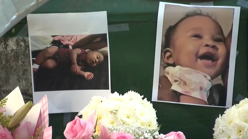 Images of 4-month-old Luna are placed in a vigil in her honor in South Los Angeles on Tuesday, Sept. 30, 2026.