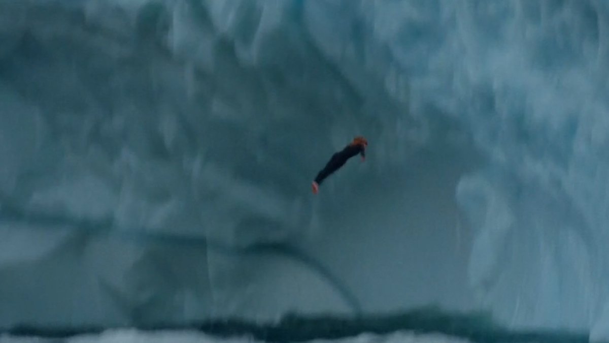 Molly Carlson makes history with first-ever dive off a 50-foot iceberg in Canada