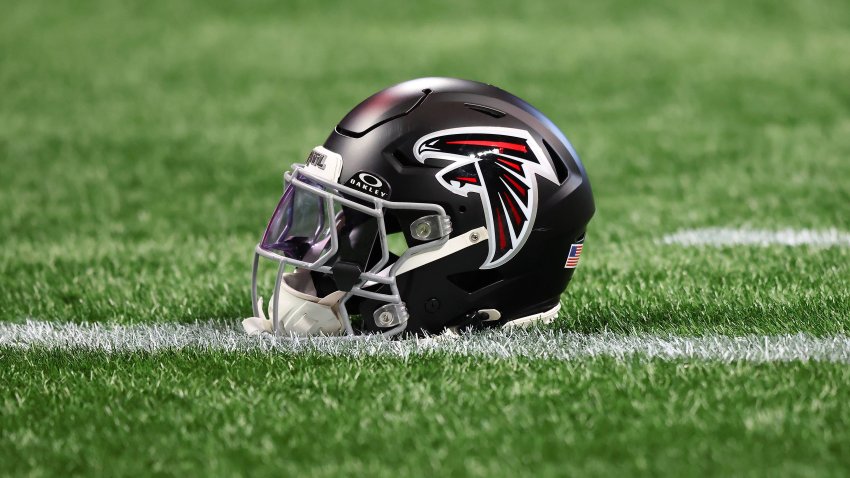 A Falcons helmet on the field.