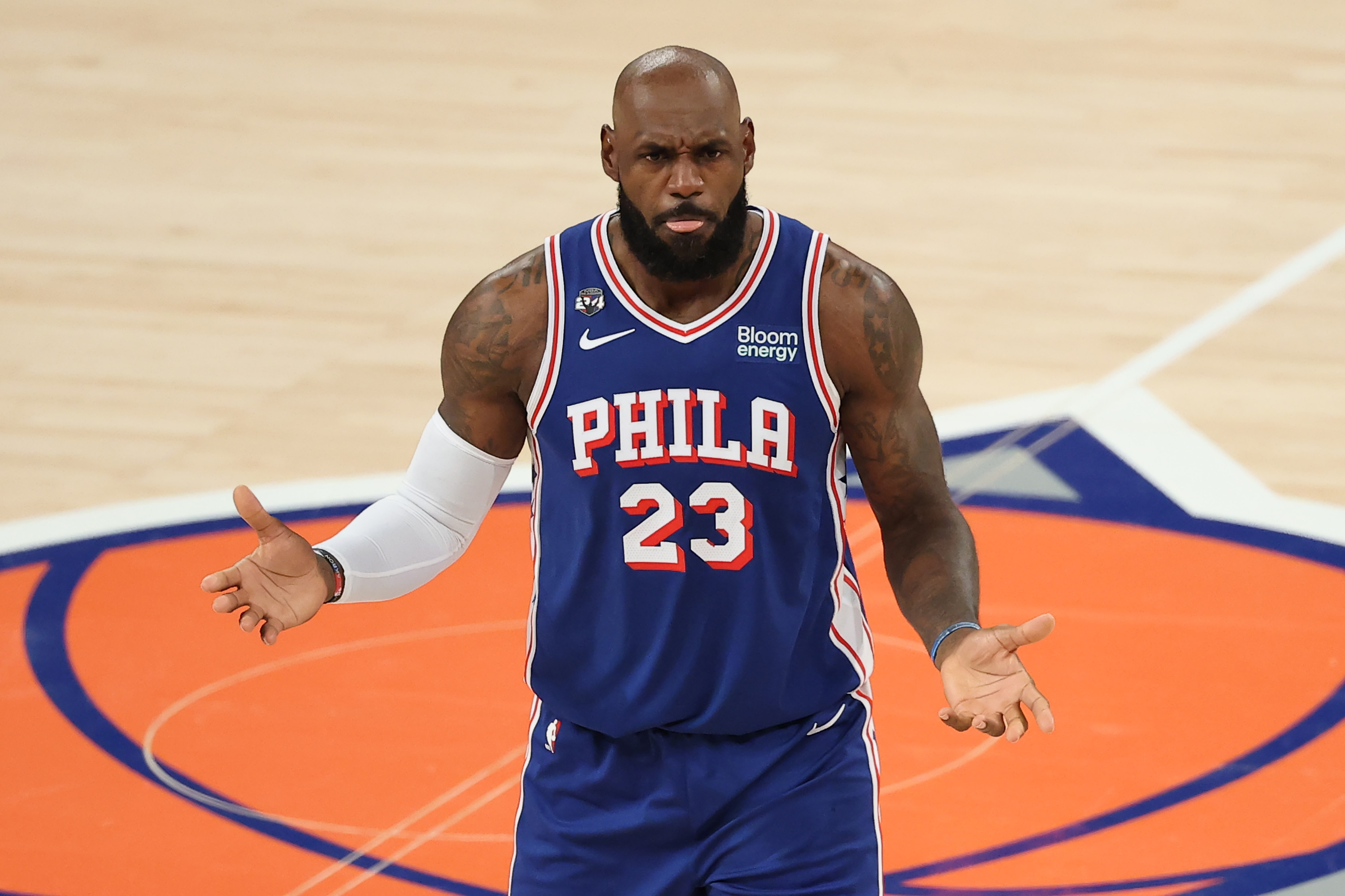 LeBron James gets into heated exchange with courtside Knicks fan in Sixers' opener