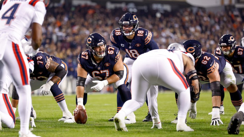 Caleb Williams #18 of the Chicago Bears calls a play.