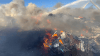Fire spreads at metal scrap yard in Fontana