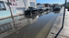 Water floods Newport Beach streets with possible record high tides ahead