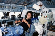 Astronaut Sally Ride floats on the Challenger flight deck.