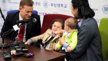 This March 15, 2017, file photo shows Robert Kelly (left), a professor at South Korea