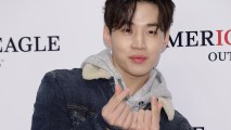 In this Oct. 25, 2017, file photo, Henry of South Korean boy band Super Junior M attends an American Eagle Outfitters event in Seoul, South Korea. The gesture he is making is referred to as the Finger Heart, and its popularity in Korean pop culture saw it spread to American athletes at the opening ceremony of the Pyeongchang Winter Games.