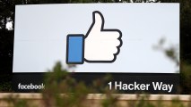 This April 5, 2018, file photo shows a sign outside of Facebook headquarters in Menlo Park, California.