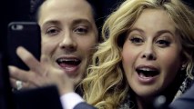 FILE - Johnny Weir and Tara Lipinski pose for a photo while working the broadcast at the U.S. Figure Skating Championships, Jan. 20, 2017, in Kansas City, Mo.