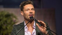 Ryan Seacrest speaks on stage at the 2017 Hamptons Paddle & Party for Pink at Fairview on Mecox Bay in Bridgehampton on Saturday, Aug. 5, 2017, in New York.