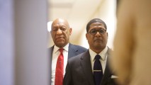 Bill Cosby (L) walks after it was announced a verdict is in at the Montgomery County Courthouse for day fourteen of his sexual assault retrial on April 26, 2018, in Norristown, Pennsylvania. Cosby was found guilty on all accounts after a former Temple University employee alleges that the entertainer drugged and molested her in 2004 at his home in suburban Philadelphia. More than 40 women have accused the 80-year-old entertainer of sexual assault.