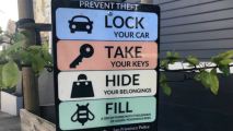 A sign encourages people to use "angry, poisonous bees" to prevent car break-ins in San Francisco. (Mar. 8, 2018)