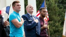 FILE - In this Sept. 11, 2015 file photo, Oregon National Guardsman Alek Skarlatos, left, U.S. Airman Spencer Stone, center, and Anthony Sadler attend a parade held to honor the three Americans who stopped a gunman on a Paris-bound passenger train, in Sacramento, Calif. The three Sacramento-area men who thwarted a terror attack on a French train in 2015 play themselves in "The 15:17 to Paris," a Clint Eastwood-directed film about their heroic feat. (AP Photo/Carl Costas, File)