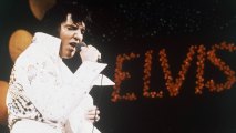 This 1972 file photo shows Elvis Presley, the King of Rock "n" Roll, during a performance.