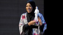 U.S. Olympic Medalist Ibtihaj Muhammad speaks onstage a new Barbie doll in her image during Glamour Celebrates 2017 Women Of The Year Live Summit at Brooklyn Museum on November 13, 2017 in New York City.