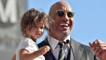Actor Dwayne Johnson and daughter Jasmine Johnson attend the ceremony honoring Dwayne Johnson with star on the Hollywood Walk of Fame on December 13, 2017 in Hollywood, California.