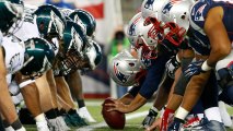 In this Dec. 6, 2015, file photo, the New England Patriots, right, and the Philadelphia Eagle get set for the snap at the line of scrimmage during an NFL football game at Gillette Stadium in Foxborough, Mass. The two teams are set to meet in Super Bowl 52 on Sunday, Feb. 4, 2018, in Minneapolis.