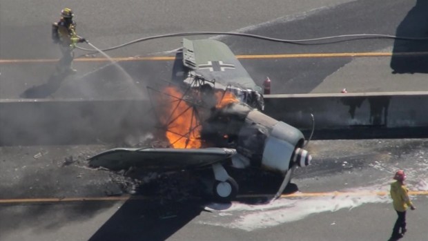 [LA]    A pilot departs after the plane crashed on 101 Freeway