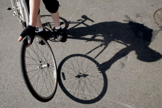Gay bicycle wheelie picture